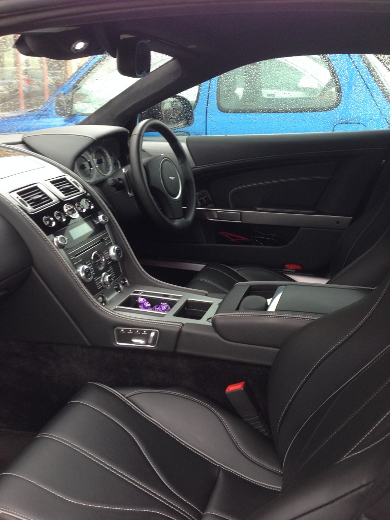Cabin of the Aston Martin DB9, note the black quilted leather