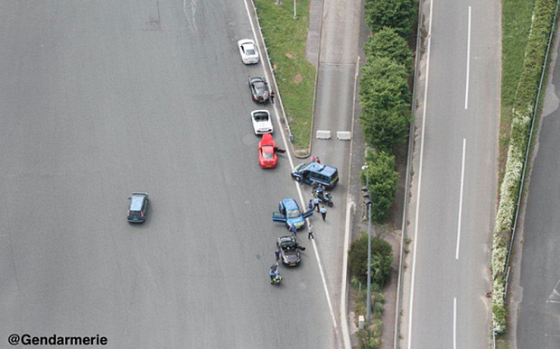 Aerial view of the halted supercar convoy