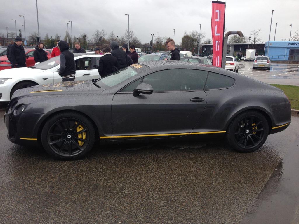 Grey Bentley Continental Supersports with yellow decal and brake calipers